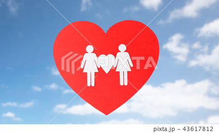 female couple white paper pictogram on red heart female couple white paper pictogram on red heart 43617812