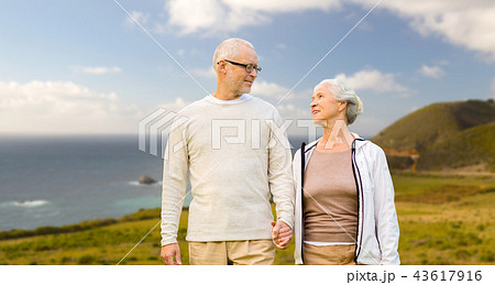 happy senior couple over big sur coast happy senior couple over big sur coast 43617916