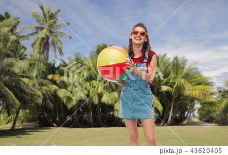 smiling teenage girl in sunglasses with beach ball 43620405