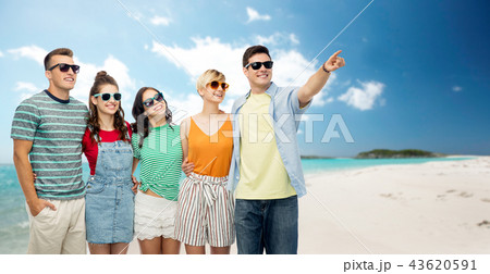 friends in sunglasses over tropical beach 43620591