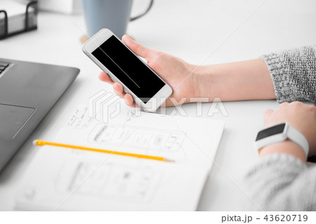 web designer creating mobile user interface 43620719