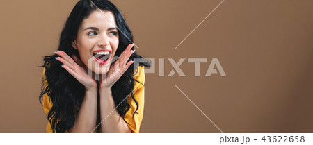 Happy young woman 43622658