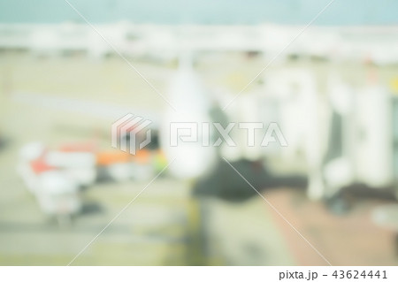 Blur background aircraft and loading area Blur background aircraft and loading area 43624441