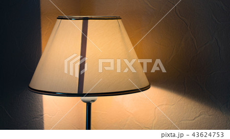 Vintage night lamp on the table with warm yellow light 43624753
