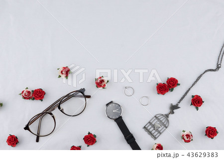 Eyeglasses, black watches, necklace and rings 43629383