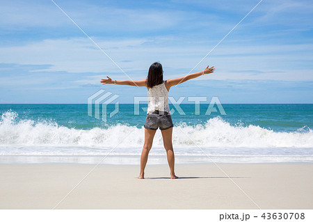 Woman on beach in summer Woman on beach in summer 43630708