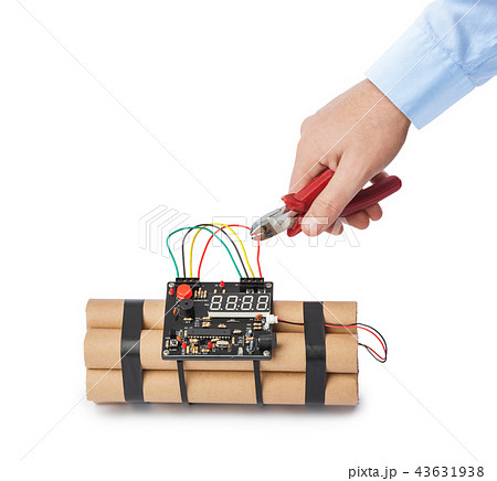Hand with pliers and dynamite bomb 43631938
