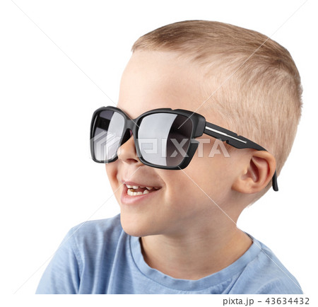 boy in sunglasses smiles at camera 43634432