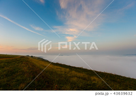 Sunrise landscape. Morning slopes covered with fog 43639632