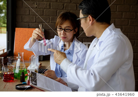 scientist test chimcal liquid in lab 43641960