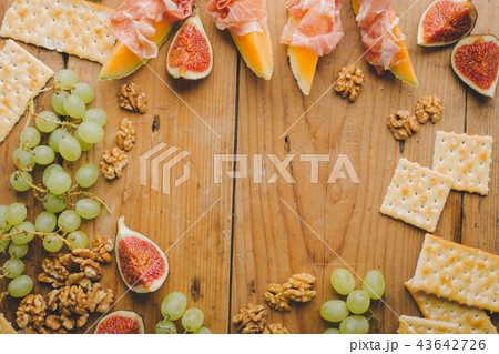 Mediterranian appetizers on old wooden table 43642726