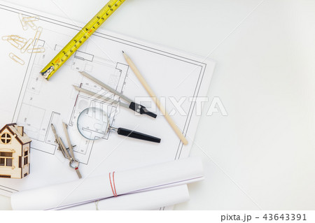 Interior designer table workplace with house plan 43643391