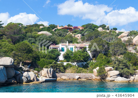 Summer sea house in beautiful village of Port Rafael, Sardinia, Italy. 43645904