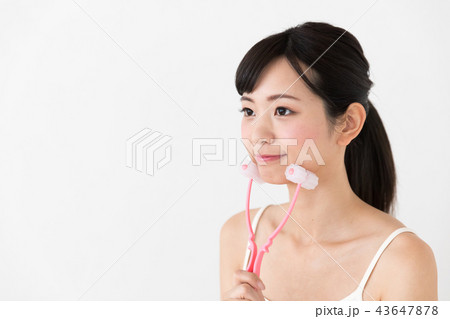 女性　フェイスローラー 43647878