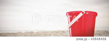 Composite image of new red bucket Composite image of new red bucket 43648408