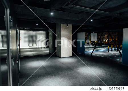 gray concrete wall in a dark room 43655943