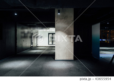 gray concrete wall in a dark room gray concrete wall in a dark room 43655954