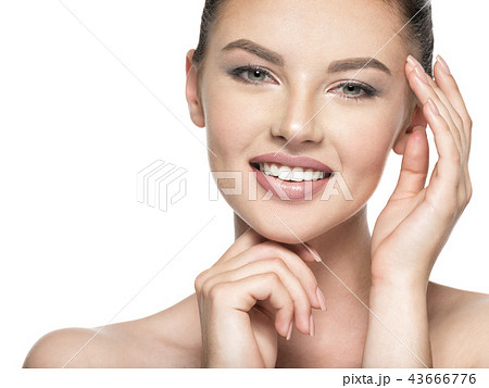 Beautiful woman cares for the skin face  43666776