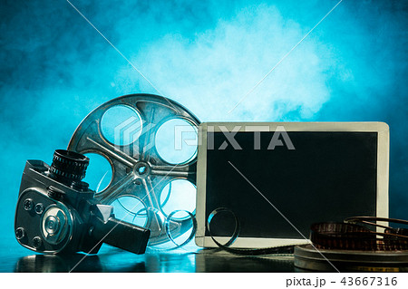 Vintage filmmakers equipment background Vintage filmmakers equipment background 43667316