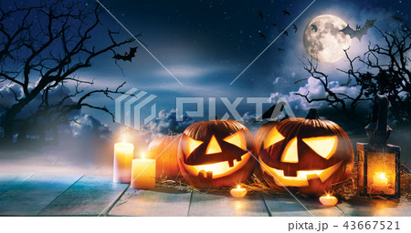 Scary horror background with halloween pumpkins Scary horror background with halloween pumpkins 43667521