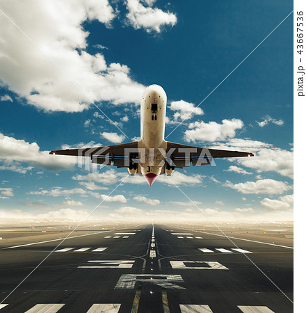 Commercial airplane taking off runway Commercial airplane taking off runway 43667536