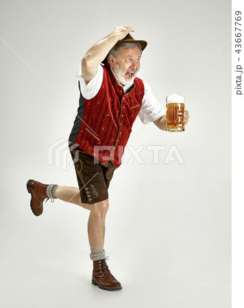 Portrait of Oktoberfest man, wearing a traditional Bavarian clothes 43667769