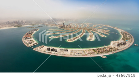 Aerial view of artificial palm island in Dubai. Aerial view of artificial palm island in Dubai. 43667919