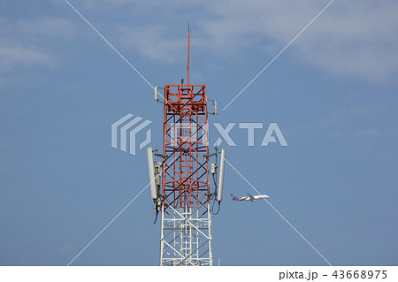 Mobile phone tower in blue sky 43668975
