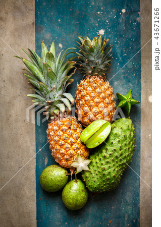 Pineapples and green fruits 43671266