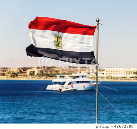 The flag of Egypt evolves against the backdrop of 43672580
