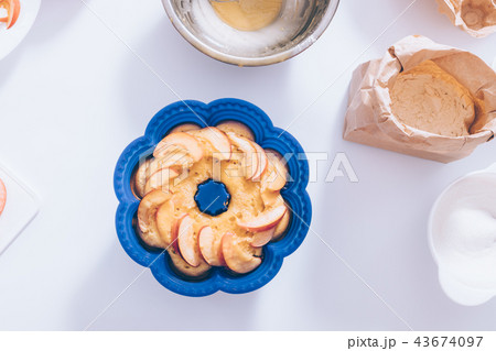Silicone form with homemade traditional apple pie 43674097