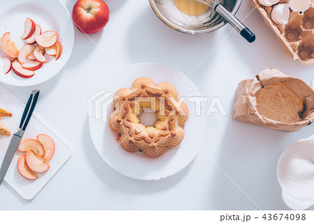 Traditional apple pie near ingredients  43674098