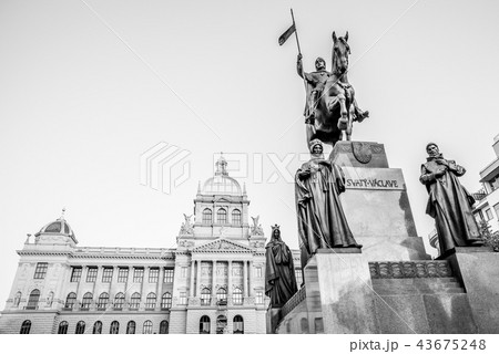 The bronze equestrian statue of St Wenceslas at the Wenceslas Square with historical Neorenaissance The bronze equestrian statue of St Wenceslas at the Wenceslas Square with historical Neorenaissance 43675248