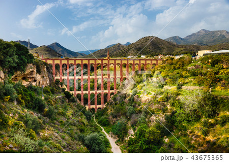 El Puente del Aguila, old aqueduct in Nerja, Spain El Puente del Aguila, old aqueduct in Nerja, Spain 43675365
