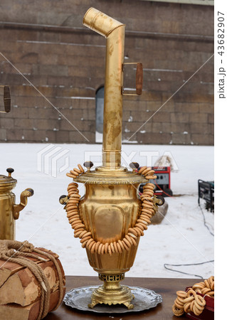 Russian samovar with tea and bagels on the street 43682907