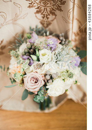 Beautiful wedding bouquet with different flowers, roses Beautiful wedding bouquet with different flowers, roses 43684268