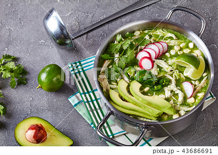 Pozole Verde in a metal casserole 43686691