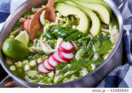 Pozole Verde in a metal casserole 43686694