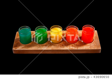 Summer cocktail on isolated black background 43690650