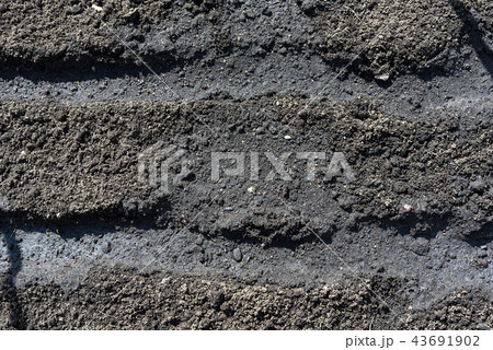 The texture of the soil close up ready for planting. 43691902