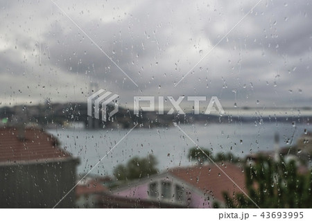 Rain drops on window against Istanbul, Turkey 43693995