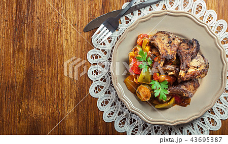 Roasted lamb chops served with ratatouille 43695387