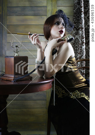 Beautiful 1930s girl smokes 43696539