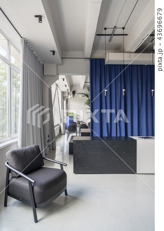 Nice interior in loft style with gray walls Nice interior in loft style with gray walls 43696679