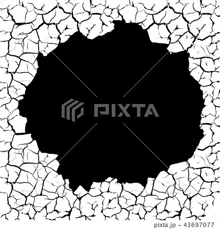 Cracks with a hole on the wall. 43697077