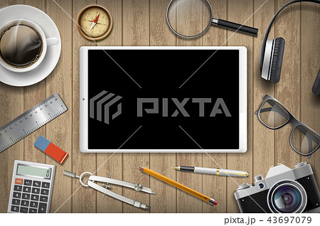 Tablet with black screen and office supplies 43697079