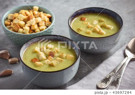 Broccoli cream soup with croutons. 43697284