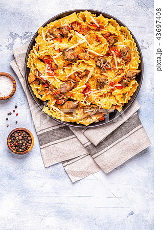Pasta with chicken liver sauce. 43697408