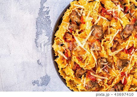 Pasta with chicken liver sauce. 43697410
