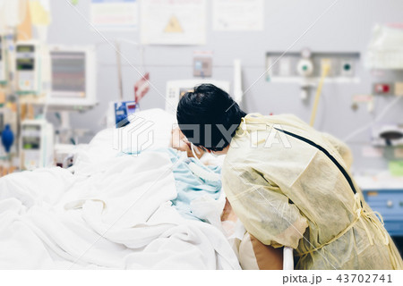 Patient relative taking care of the elder patient 43702741